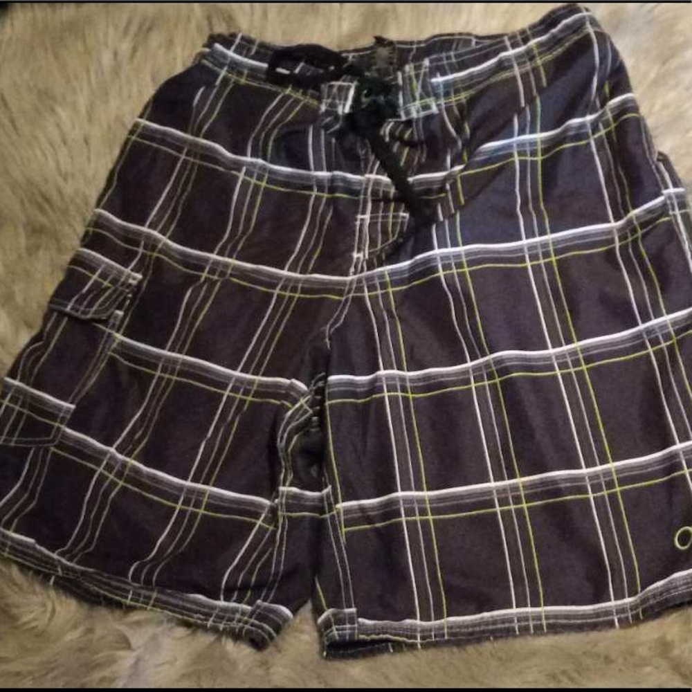 Men’s OP swimming trunks, size L, used condition.